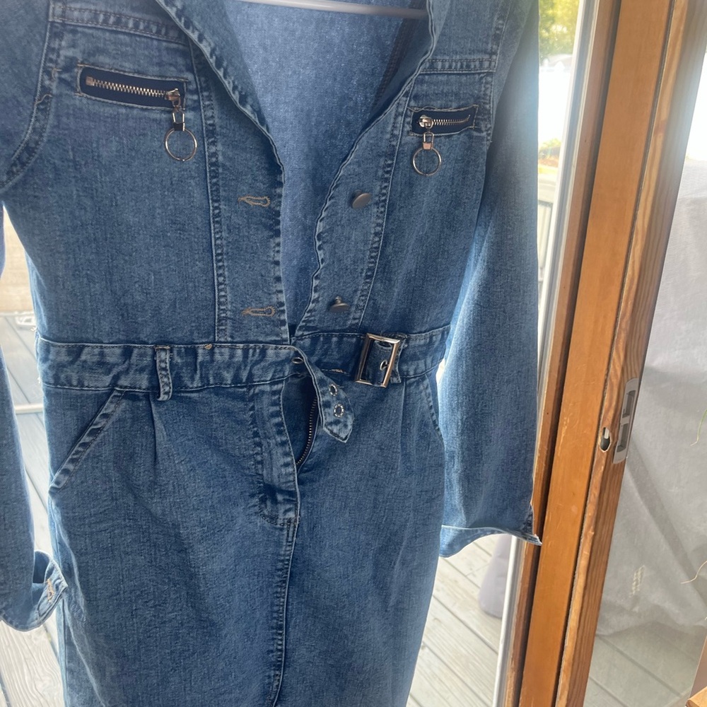 Brand new Jean dress . Never worn .
